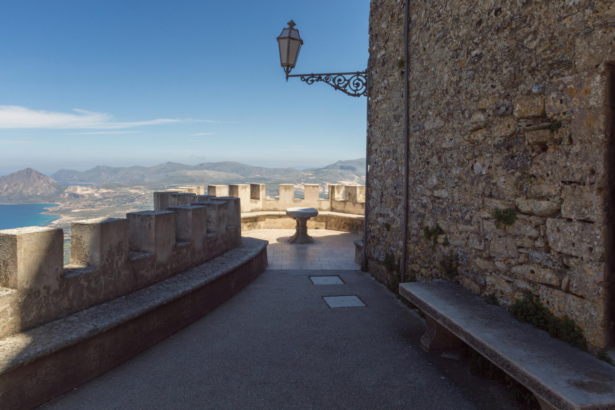 Experience the breathtaking vistas from Erice, Sicily, with ancient stone architecture and panoramic landscapes.